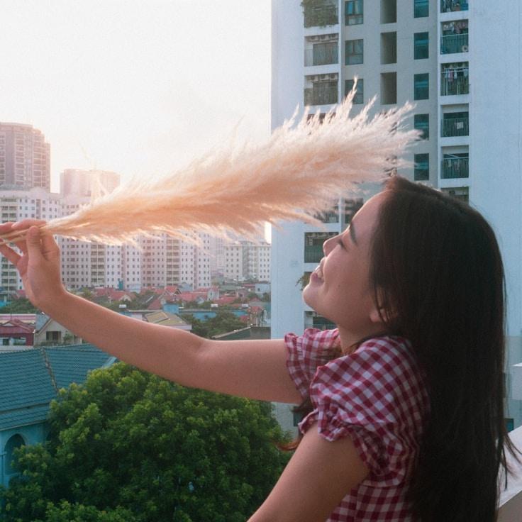 Alex Rivera, Lead Design Curator at Cedar Trail Rest, reviewing corporate floral arrangements